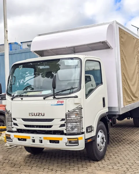 Front view of a new white Isuzu NQR Xtra commercial truck with a box body and canvas rear, ideal for reliable cargo transport in Kenya.